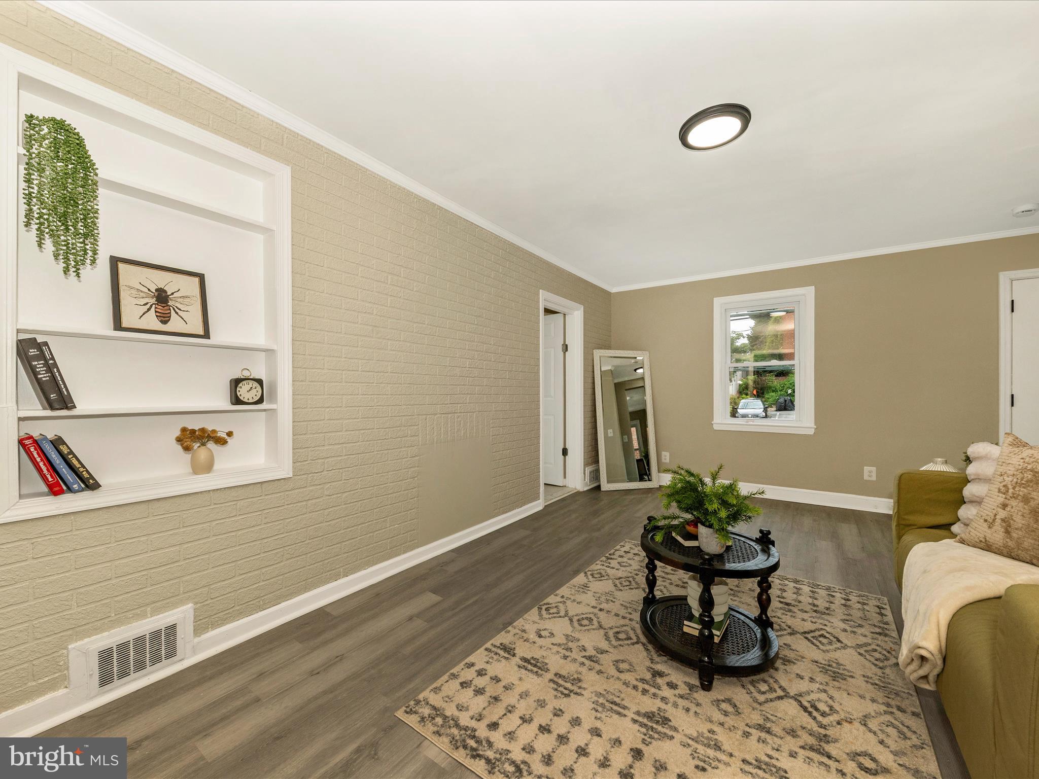 8709 Bradford Road Silver Spring, MD 20901 - Photo 19 of 51 a living room with furniture and window