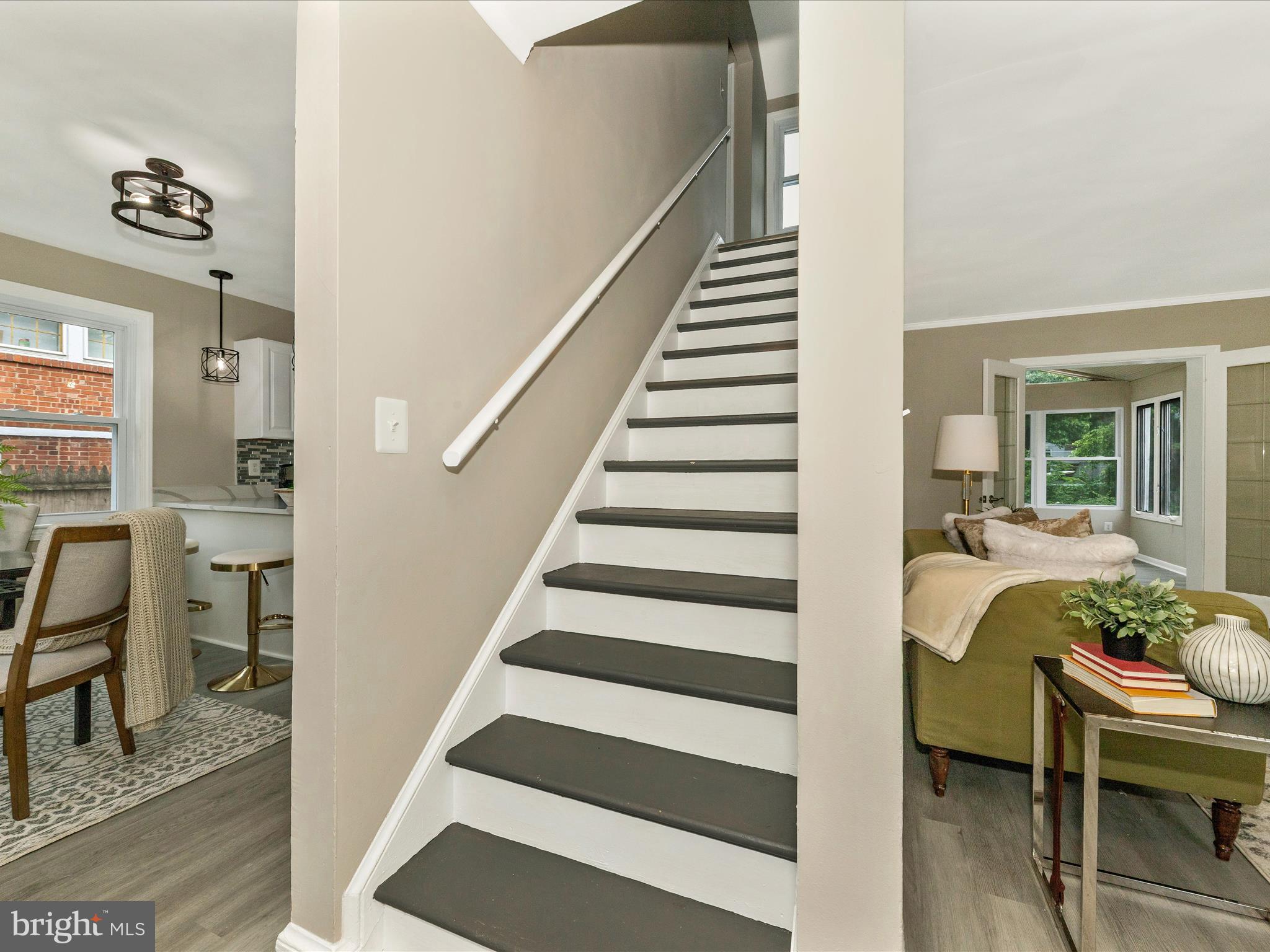 8709 Bradford Road Silver Spring, MD 20901 - Photo 32 of 51 a view of entryway and hall with wooden floor