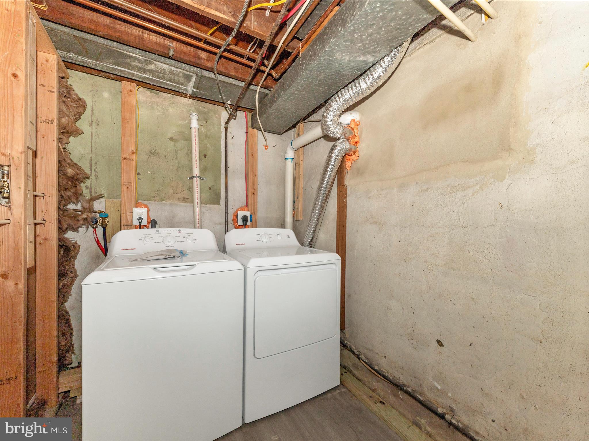 8709 Bradford Road Silver Spring, MD 20901 - Photo 39 of 51 a view of bathroom with a washer and dryer