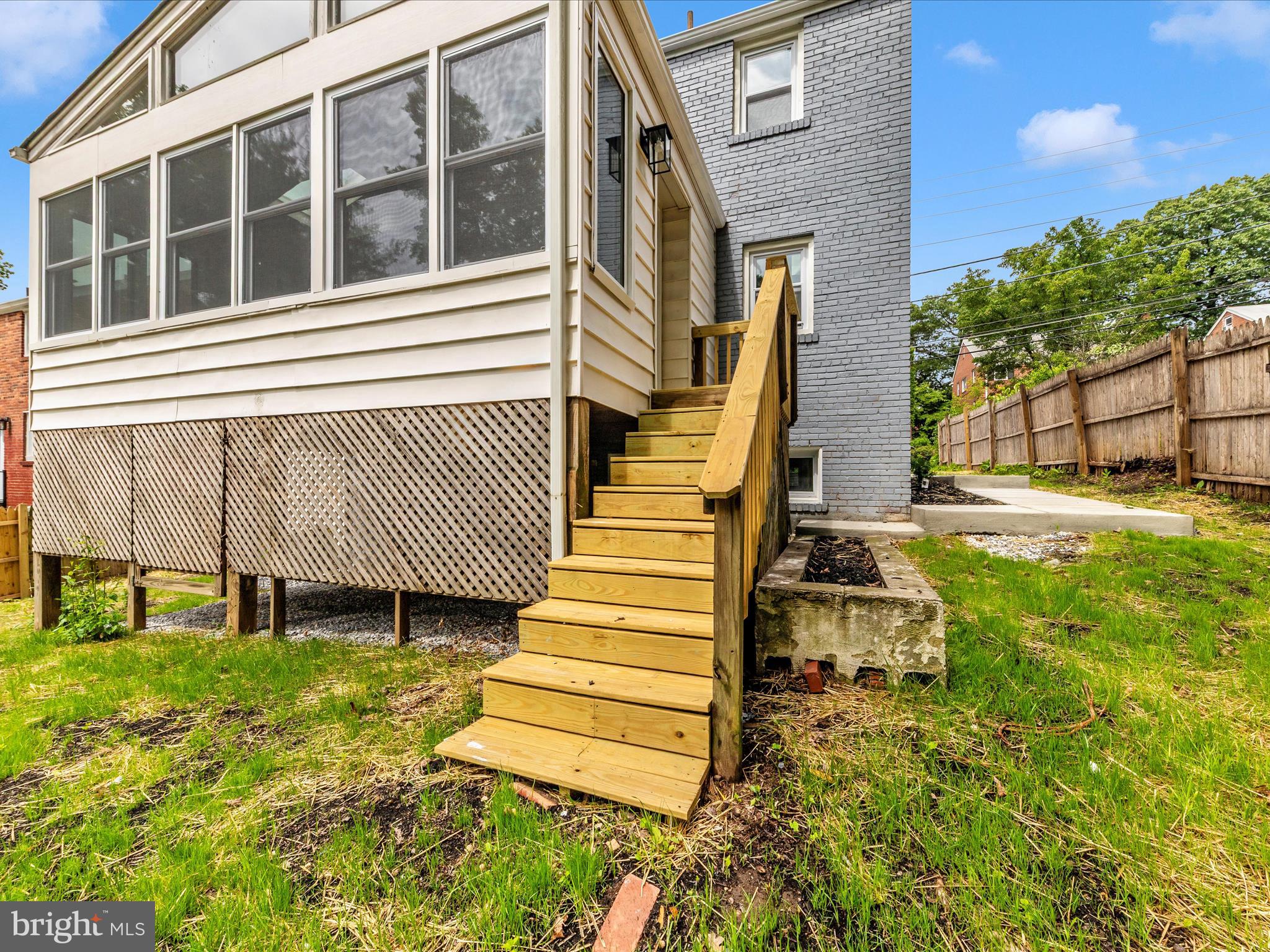 8709 Bradford Road Silver Spring, MD 20901 - Photo 48 of 51 a front view of a house with a yard