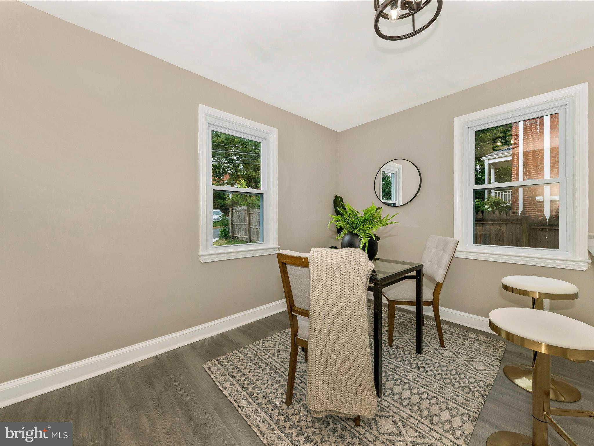 8709 Bradford Road Silver Spring, MD 20901 - Photo 5 of 51 a dining room with furniture and window