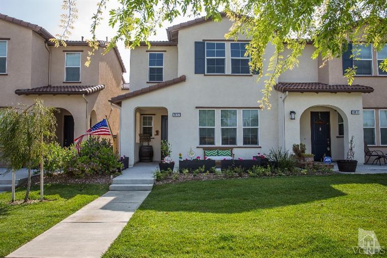 3012 North Ventura Road Oxnard, CA 93036 - Photo 1 of 29 a front view of a house with a garden and plants