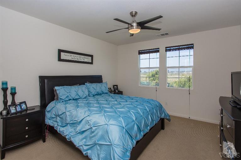 3012 North Ventura Road Oxnard, CA 93036 - Photo 14 of 29 a bedroom with a bed and a window