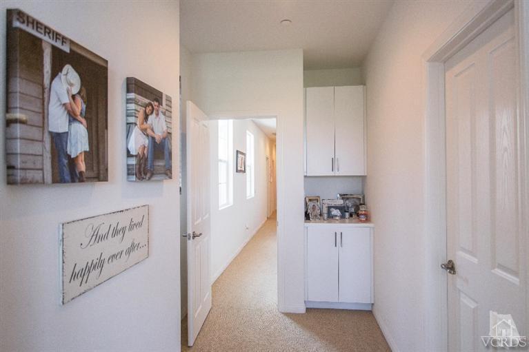 3012 North Ventura Road Oxnard, CA 93036 - Photo 19 of 29 a kitchen with a refrigerator and a stove