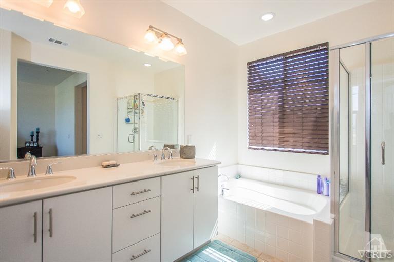 3012 North Ventura Road Oxnard, CA 93036 - Photo 20 of 29 a bathroom with a sink double vanity and a mirror
