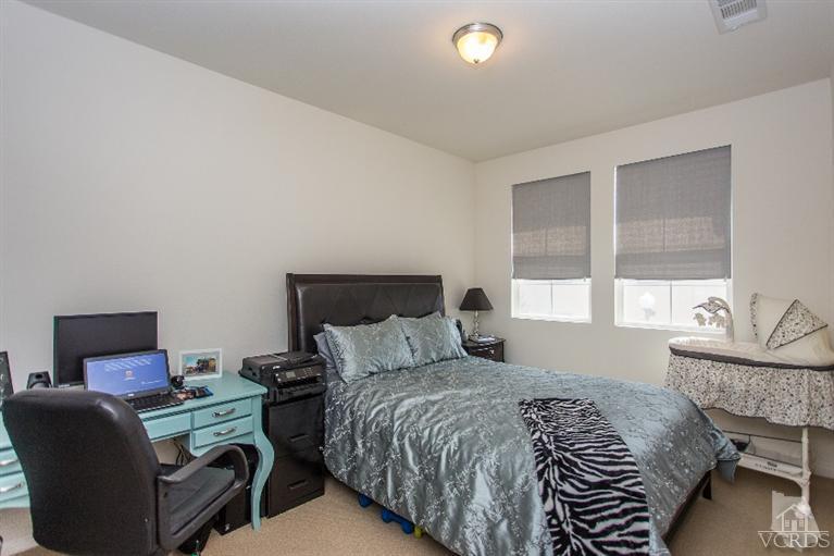 3012 North Ventura Road Oxnard, CA 93036 - Photo 23 of 29 a bedroom with a bed and window