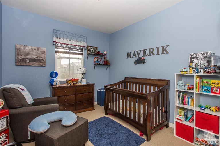 3012 North Ventura Road Oxnard, CA 93036 - Photo 25 of 29 a bedroom with furniture and a window