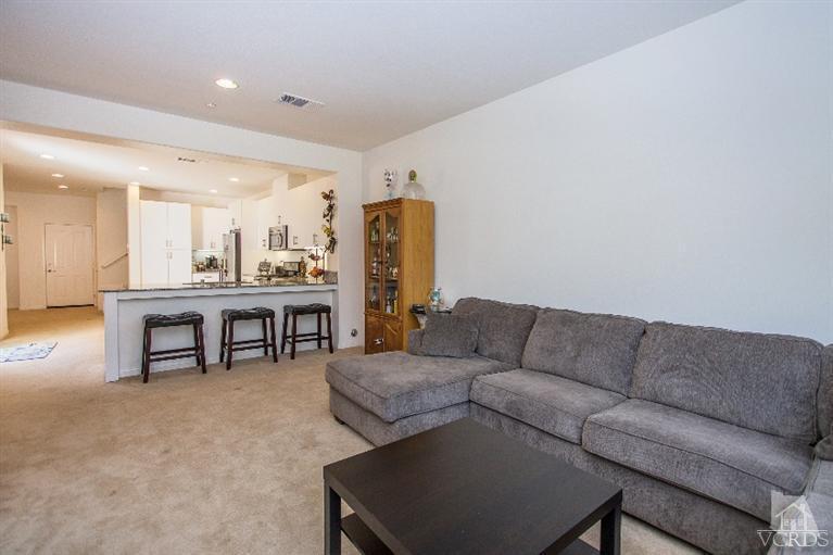3012 North Ventura Road Oxnard, CA 93036 - Photo 4 of 29 a living room with furniture and a table