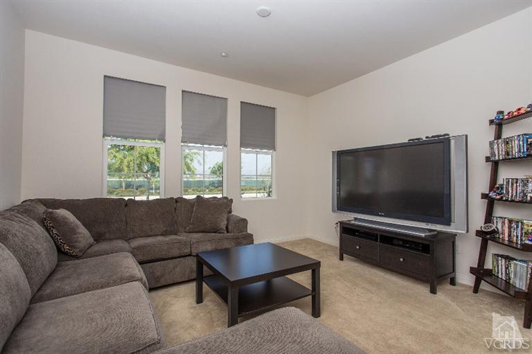 3012 North Ventura Road Oxnard, CA 93036 - Photo 6 of 29 a living room with furniture and a flat screen tv