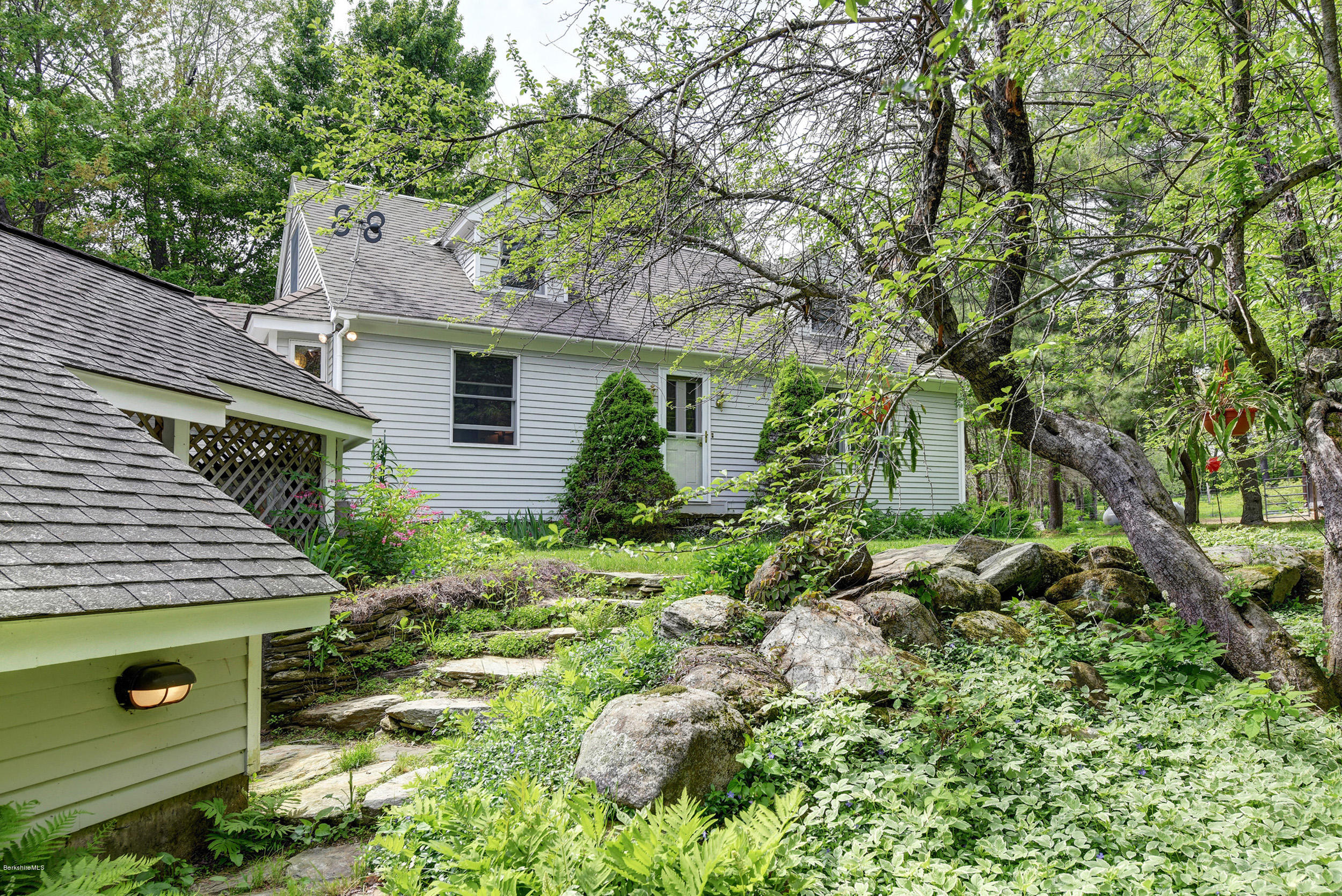139 Arthur Pease Road Middlefield, MA 01011 - Photo 3 of 42 a view of a garden with large trees