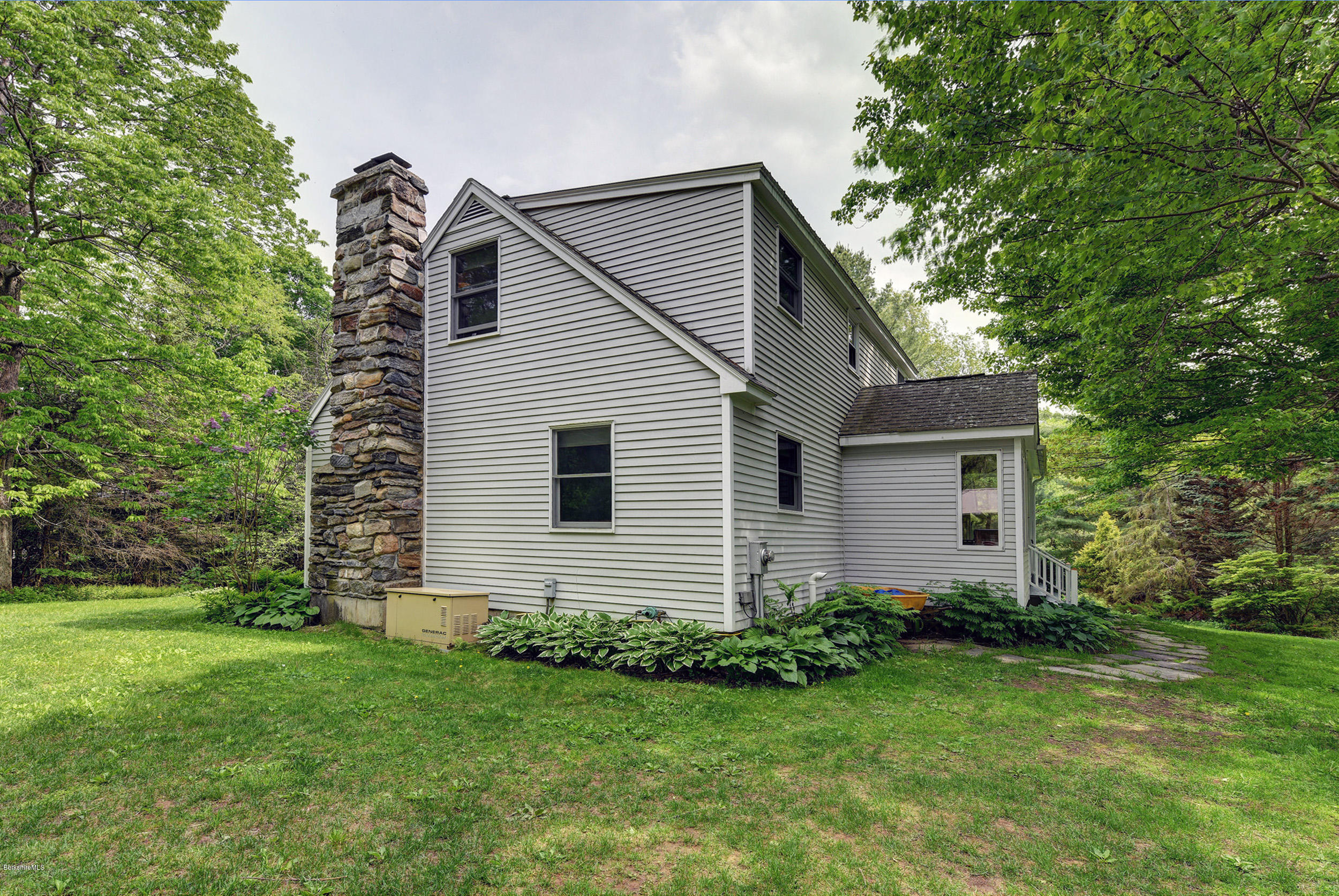 139 Arthur Pease Road Middlefield, MA 01011 - Photo 8 of 42 a view of a house with a yard