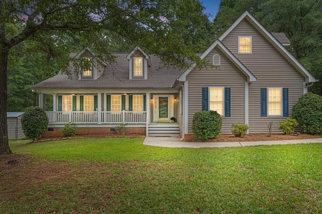 1757 Futral Road Griffin, GA 30224 - Photo 1 of 1 a front view of a house with a yard