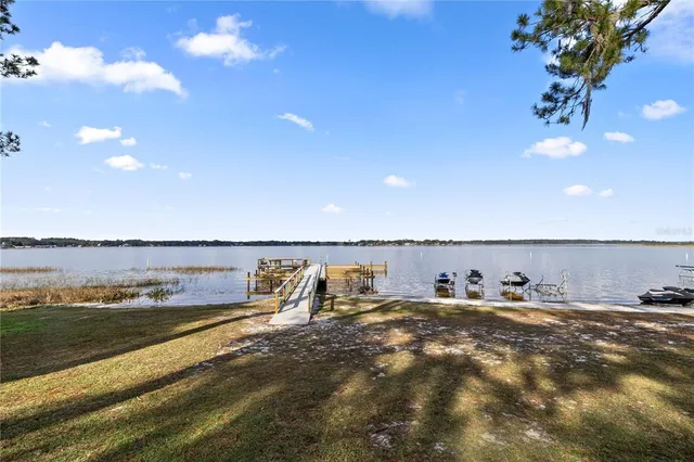 a view of a water with an outdoor seating