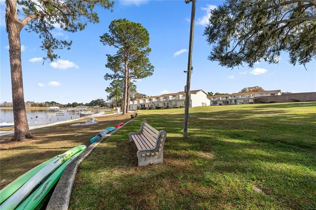 a view of a lake with a big yard