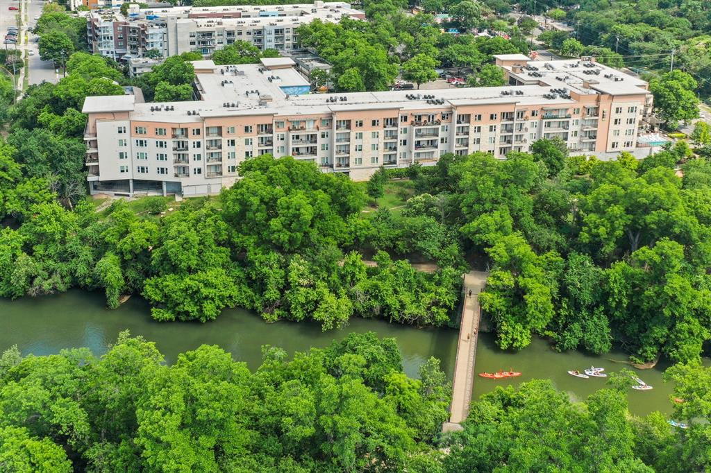 1900 Barton Springs Road, Unit 3013 Austin, TX 78704 - Photo 26 of 27 Riverside living with picturesque green surroundings and direct access to waterfront recreation awaits.