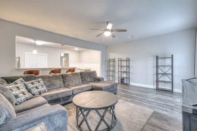 a bathroom with a sink a mirror and vanity