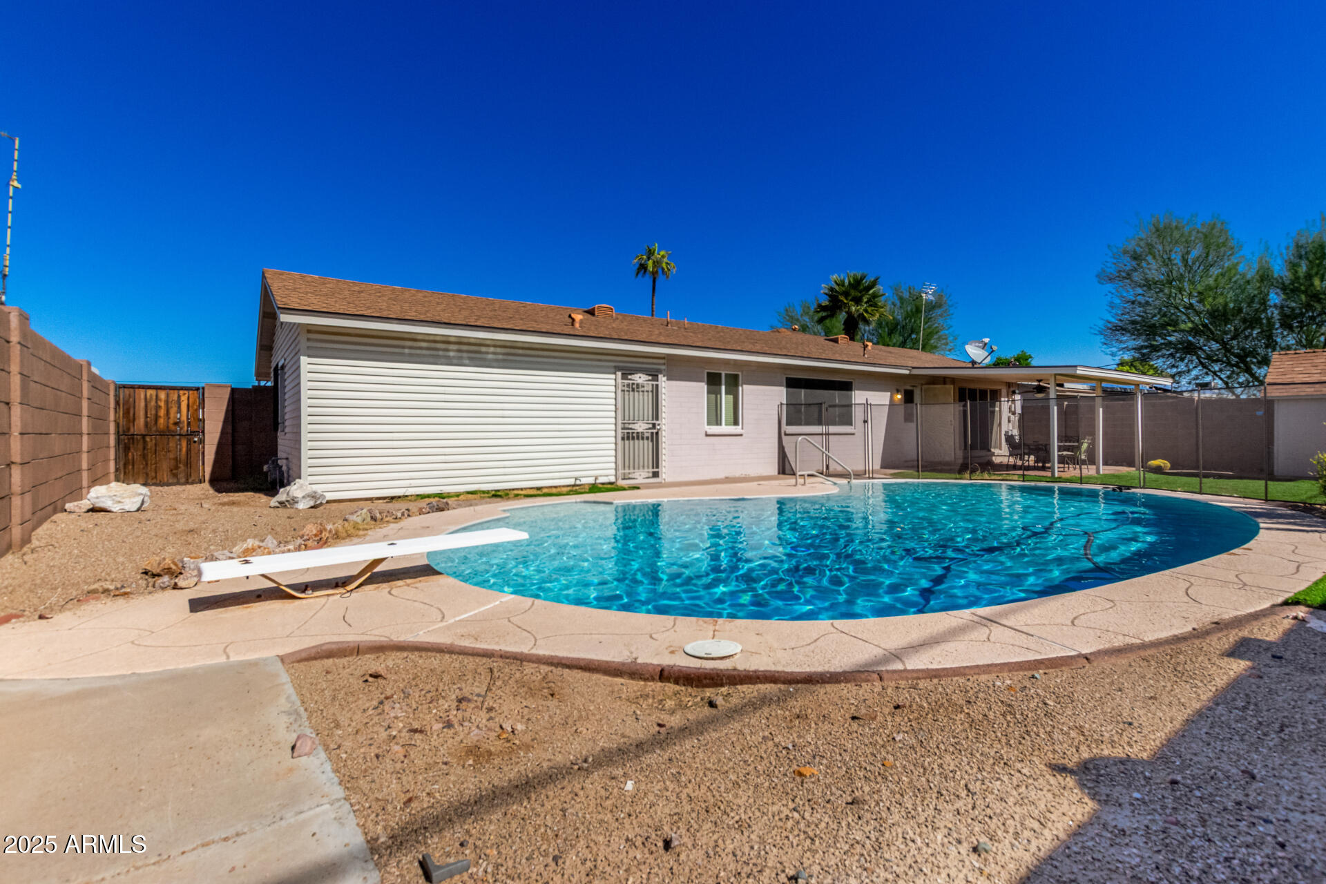 3045 East Cholla Street Phoenix, AZ 85028 - Photo 23 of 23 front view of a house with a patio