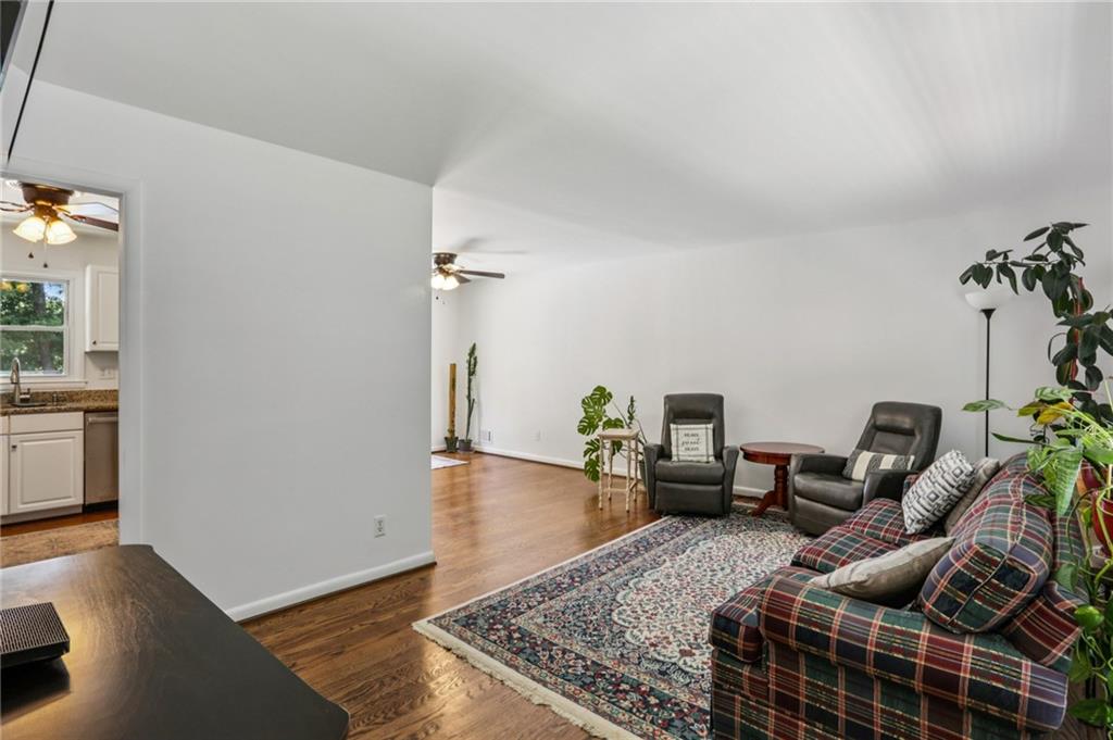 2740 Frontier Trail Atlanta, GA 30341 - Photo 10 of 29 a living room with furniture and wooden floor