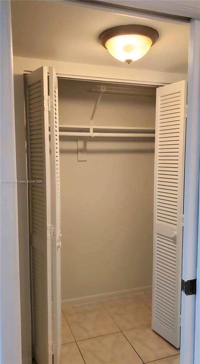 250 180th Drive, Unit 510 Sunny Isles Beach, FL 33160 - Photo 16 of 19 a view of closet