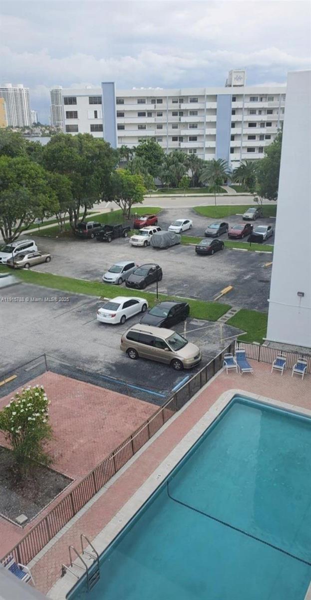 250 180th Drive, Unit 510 Sunny Isles Beach, FL 33160 - Photo 3 of 19 a view of a tennis court