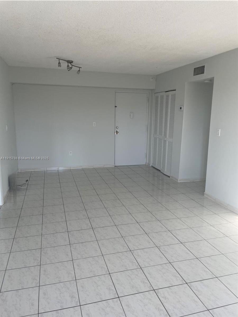 250 180th Drive, Unit 510 Sunny Isles Beach, FL 33160 - Photo 6 of 19 a view of an empty room