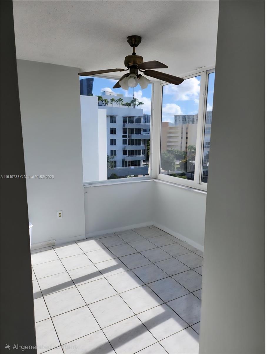 250 180th Drive, Unit 510 Sunny Isles Beach, FL 33160 - Photo 8 of 19 a view of an empty room and window