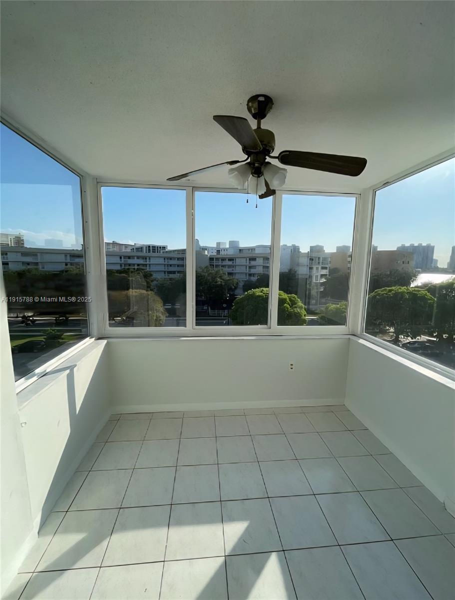 250 180th Drive, Unit 510 Sunny Isles Beach, FL 33160 - Photo 9 of 19 a view of an empty room with a window