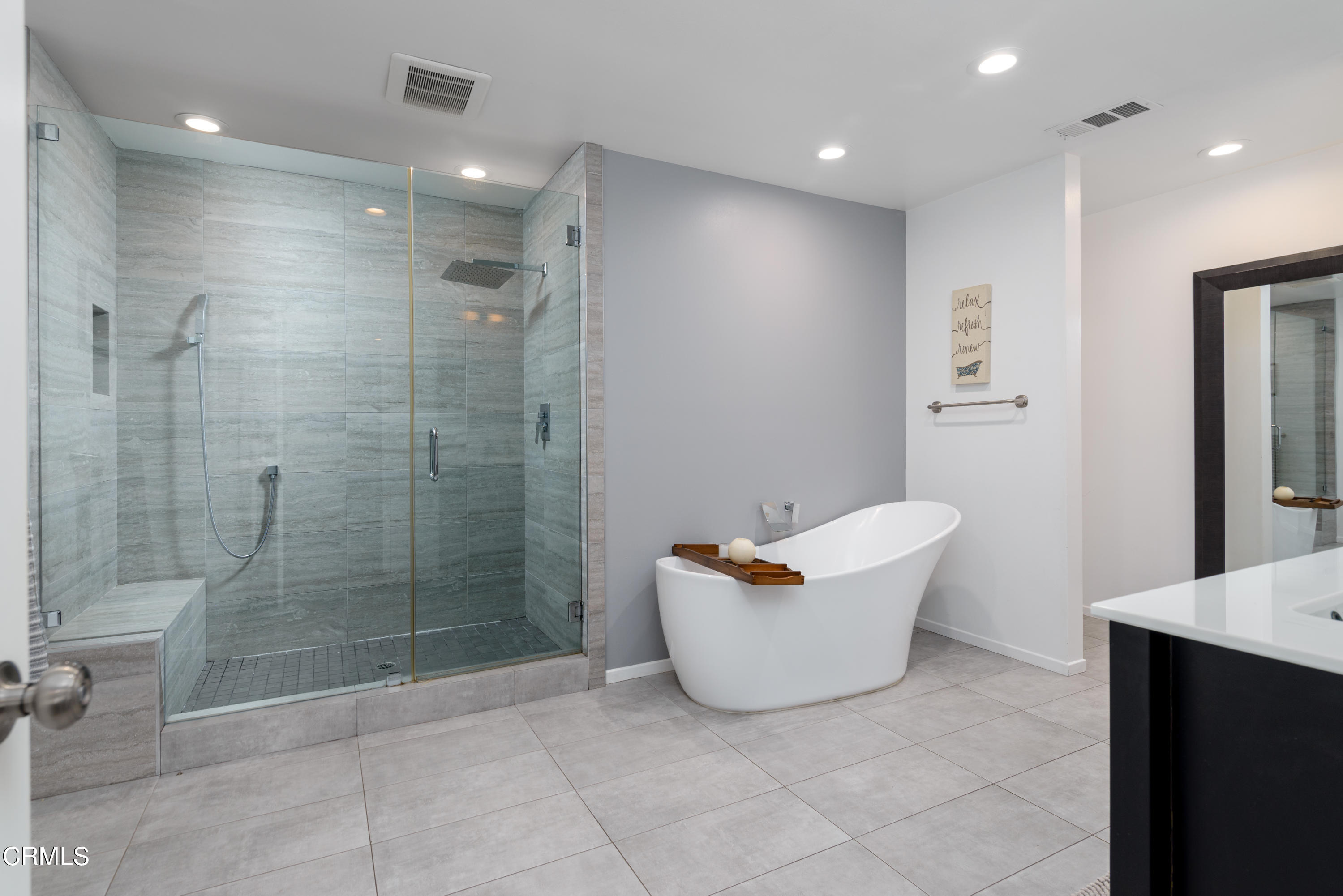 4274 Peach Slope Road Moorpark, CA 93021 - Photo 15 of 27 a bathroom with a shower and bathtub