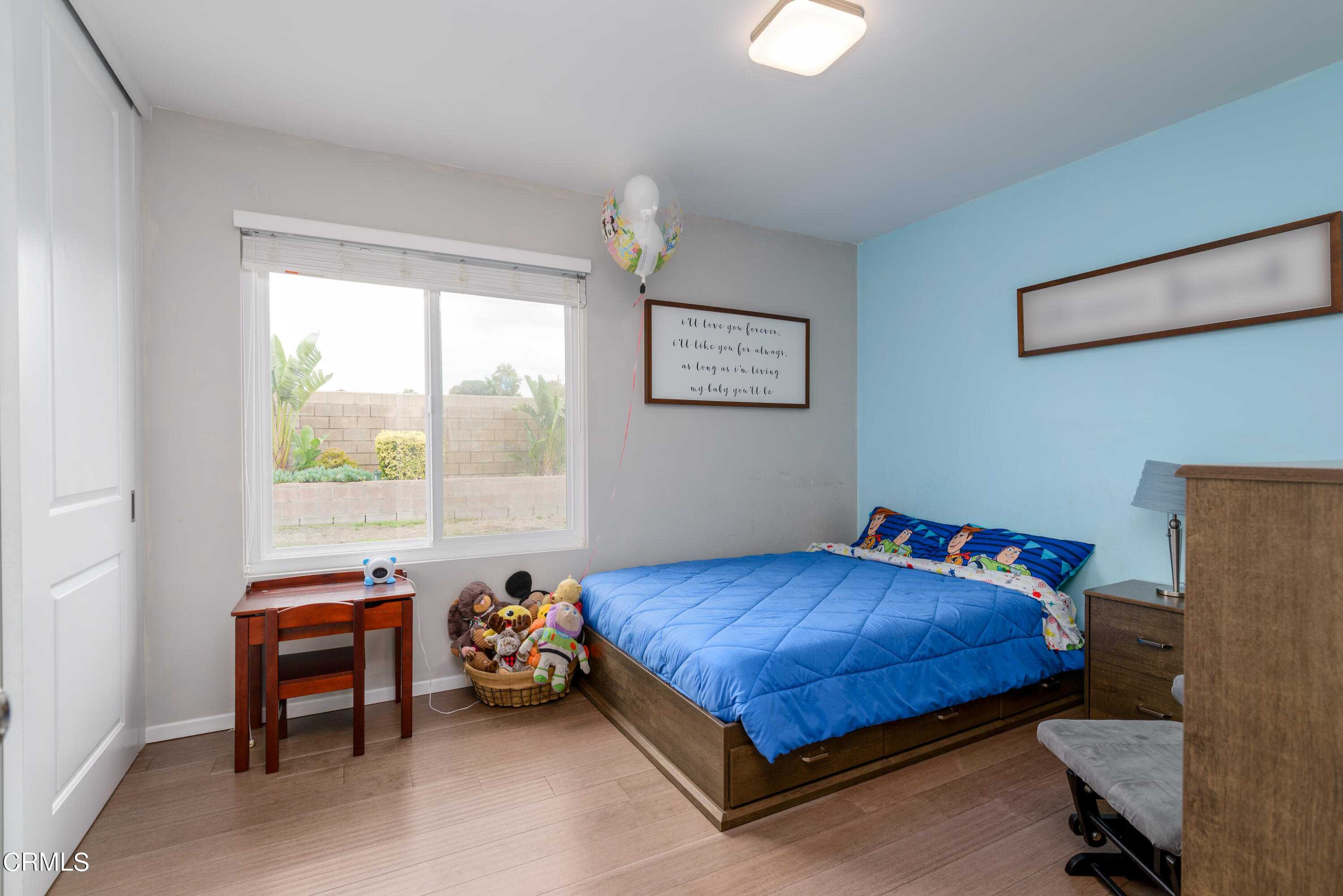 4274 Peach Slope Road Moorpark, CA 93021 - Photo 21 of 27 a bedroom with a bed and a window