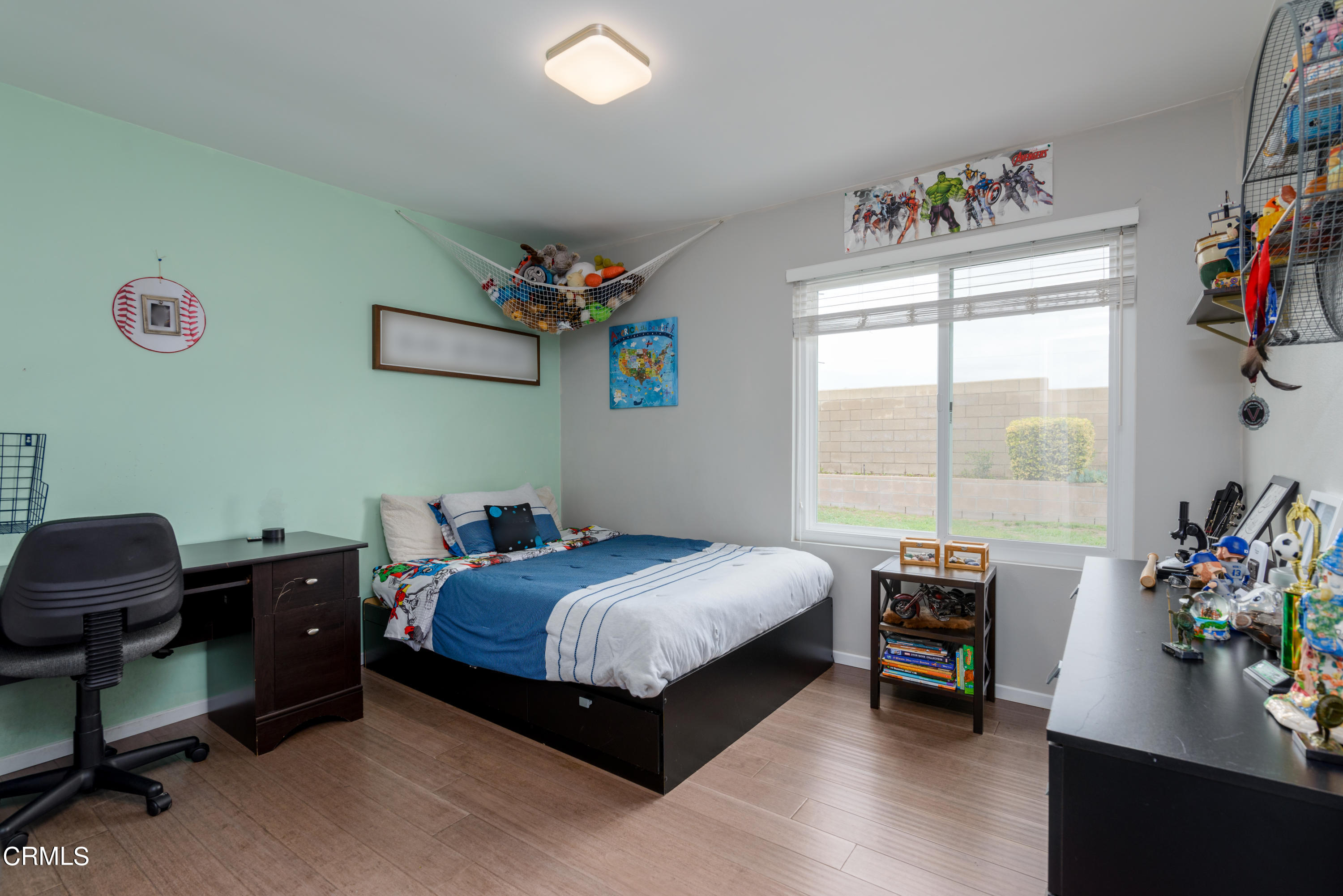 4274 Peach Slope Road Moorpark, CA 93021 - Photo 22 of 27 a bedroom with bed and a window