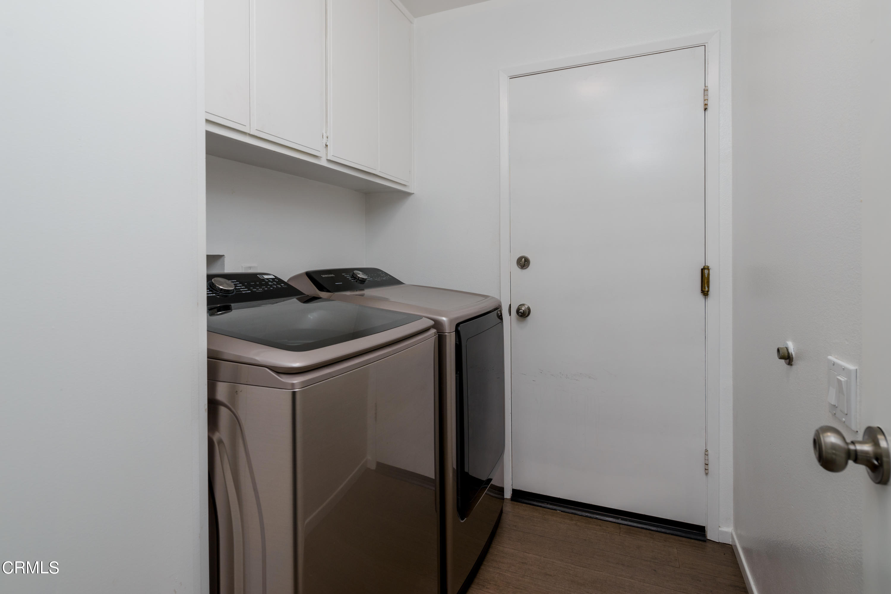 4274 Peach Slope Road Moorpark, CA 93021 - Photo 24 of 27 a utility room with dryer and washer