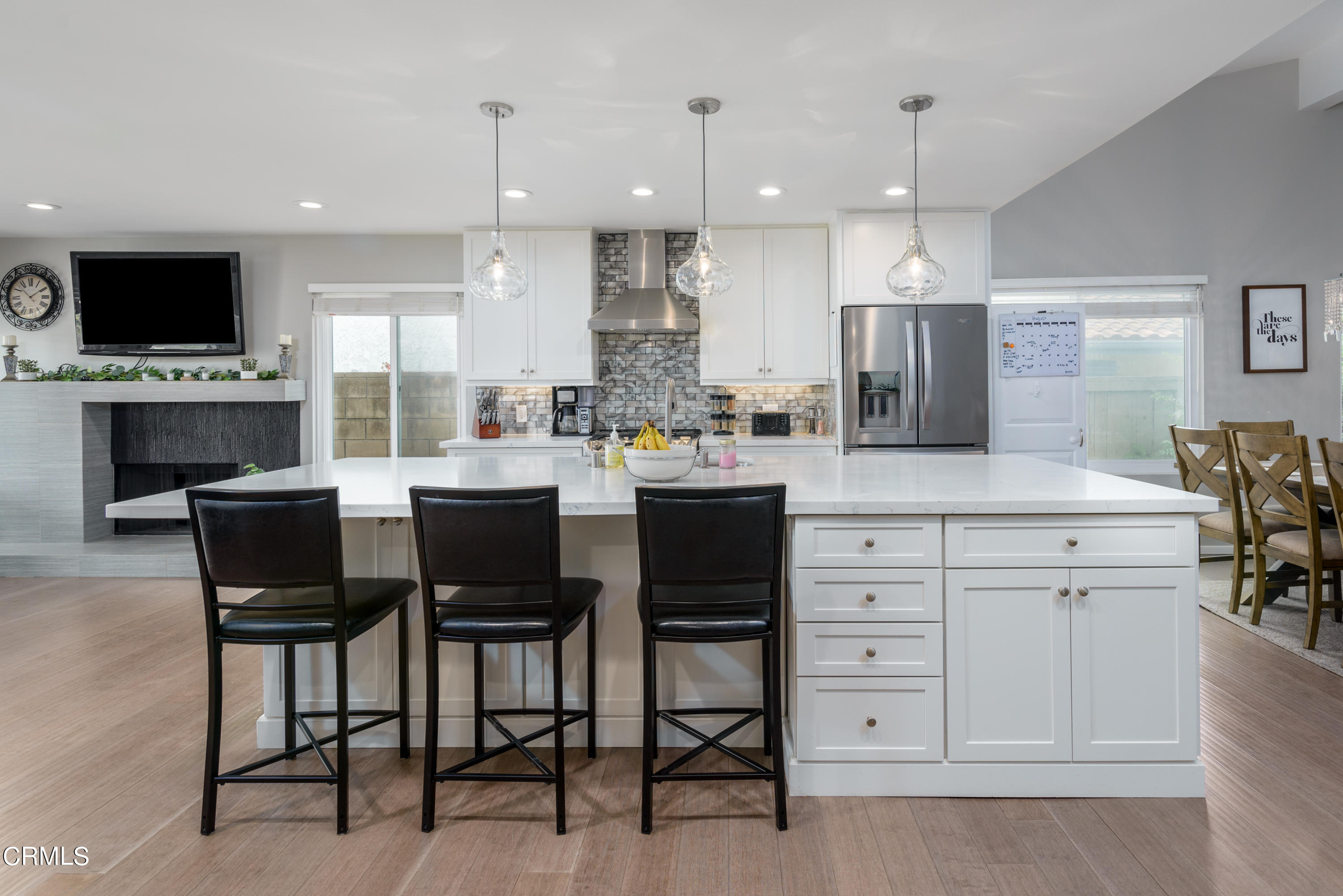 4274 Peach Slope Road Moorpark, CA 93021 - Photo 10 of 27 a large kitchen with a table and chairs