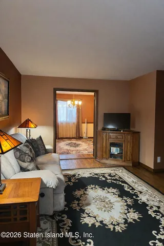 a side view of a house with a garden