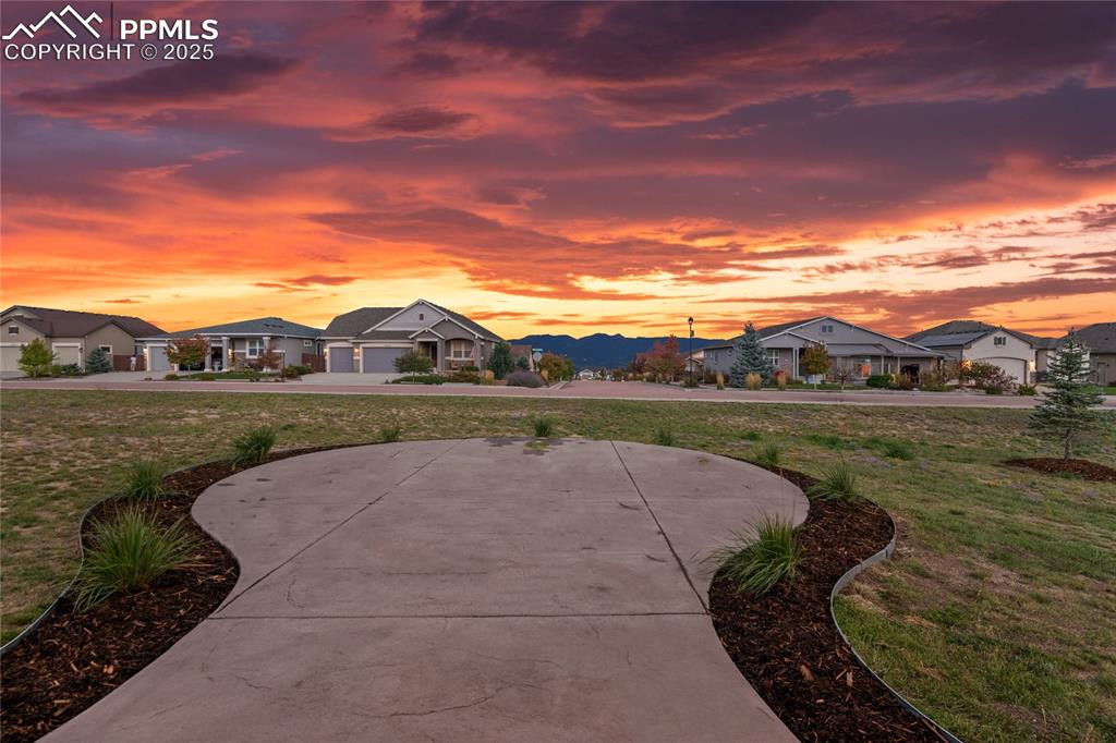3718 Sky Rim Court Colorado Springs, CO 80908 - Photo 11 of 49 a view of swimming pool with a yard