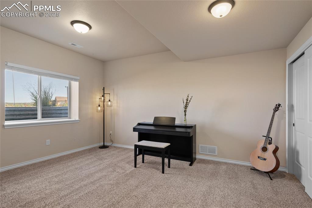 3718 Sky Rim Court Colorado Springs, CO 80908 - Photo 41 of 49 a view of a room with gym equipment