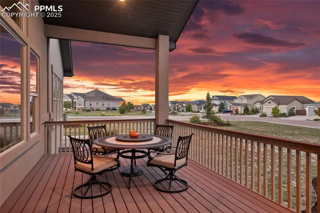 a view of balcony with furniture
