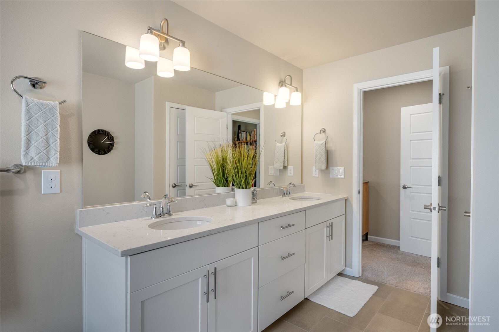 216 178th Street Southeast Bothell, WA 98012 - Photo 26 of 40 a bathroom with a double vanity sink mirror and shower