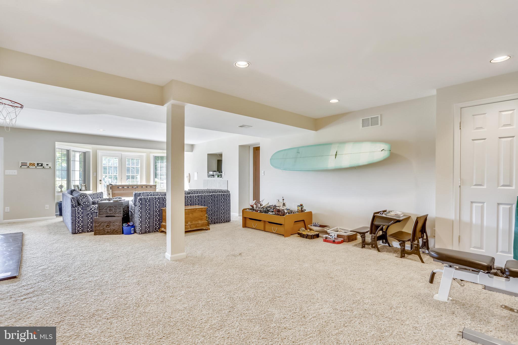 2113 Link Road Silver Spring, MD 20905 - Photo 42 of 78 a bedroom with furniture and a flat tv screen