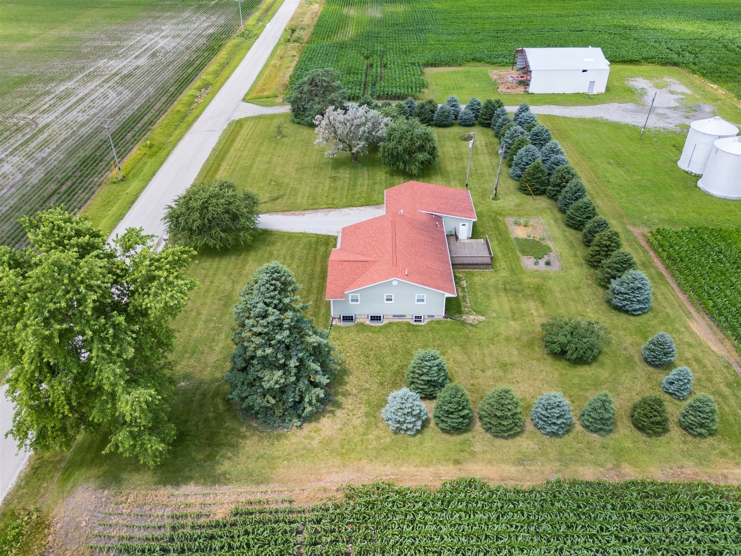 32931 East 1000 N Road Chatsworth, IL 60921 - Photo 27 of 42 a aerial view of a house with a yard and lake view