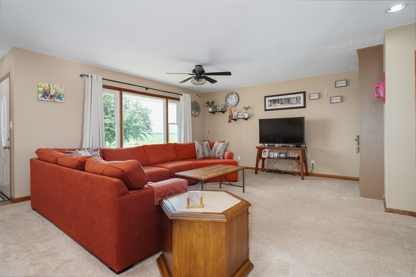 32931 East 1000 N Road Chatsworth, IL 60921 - Photo 3 of 42 a living room with furniture and a flat screen tv