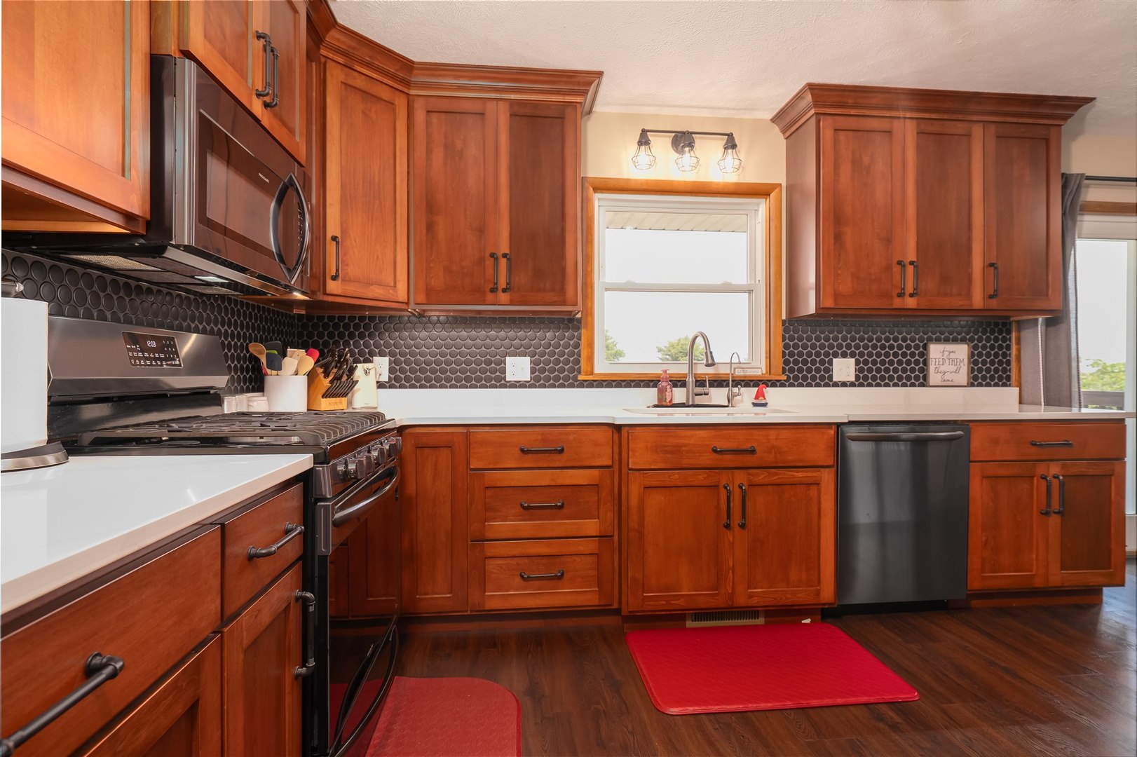32931 East 1000 N Road Chatsworth, IL 60921 - Photo 8 of 42 a kitchen with stainless steel appliances granite countertop a sink stove and cabinets