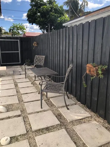 a view of outdoor space with seating area