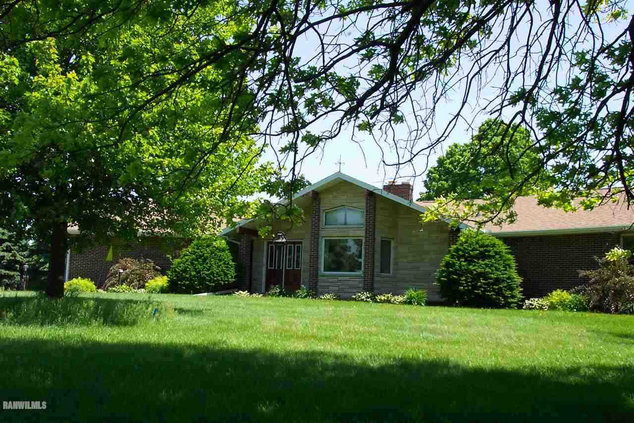 4657 North Illinois Route Forreston, IL 61030 - Photo 1 of 39 a view of a house with a garden