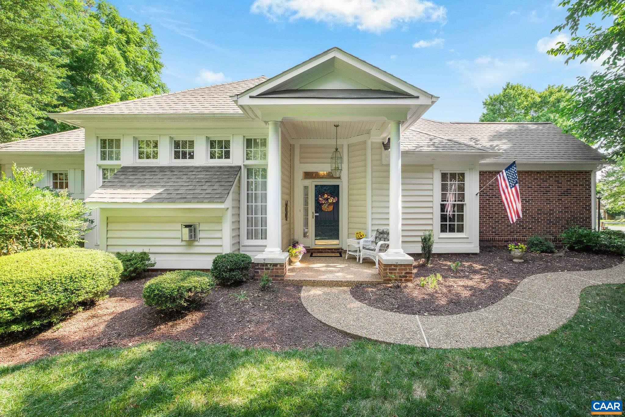 2111 Shepherds Ridge Road Charlottesville, VA 22901 - Photo 1 of 31 a front view of a house with garden