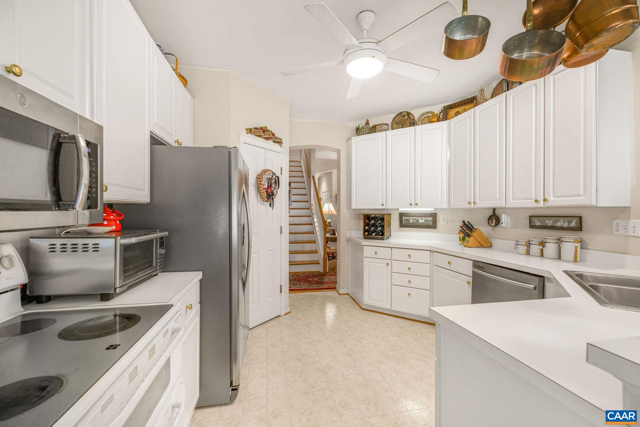 2111 Shepherds Ridge Road Charlottesville, VA 22901 - Photo 15 of 31 a kitchen with a sink stove and refrigerator