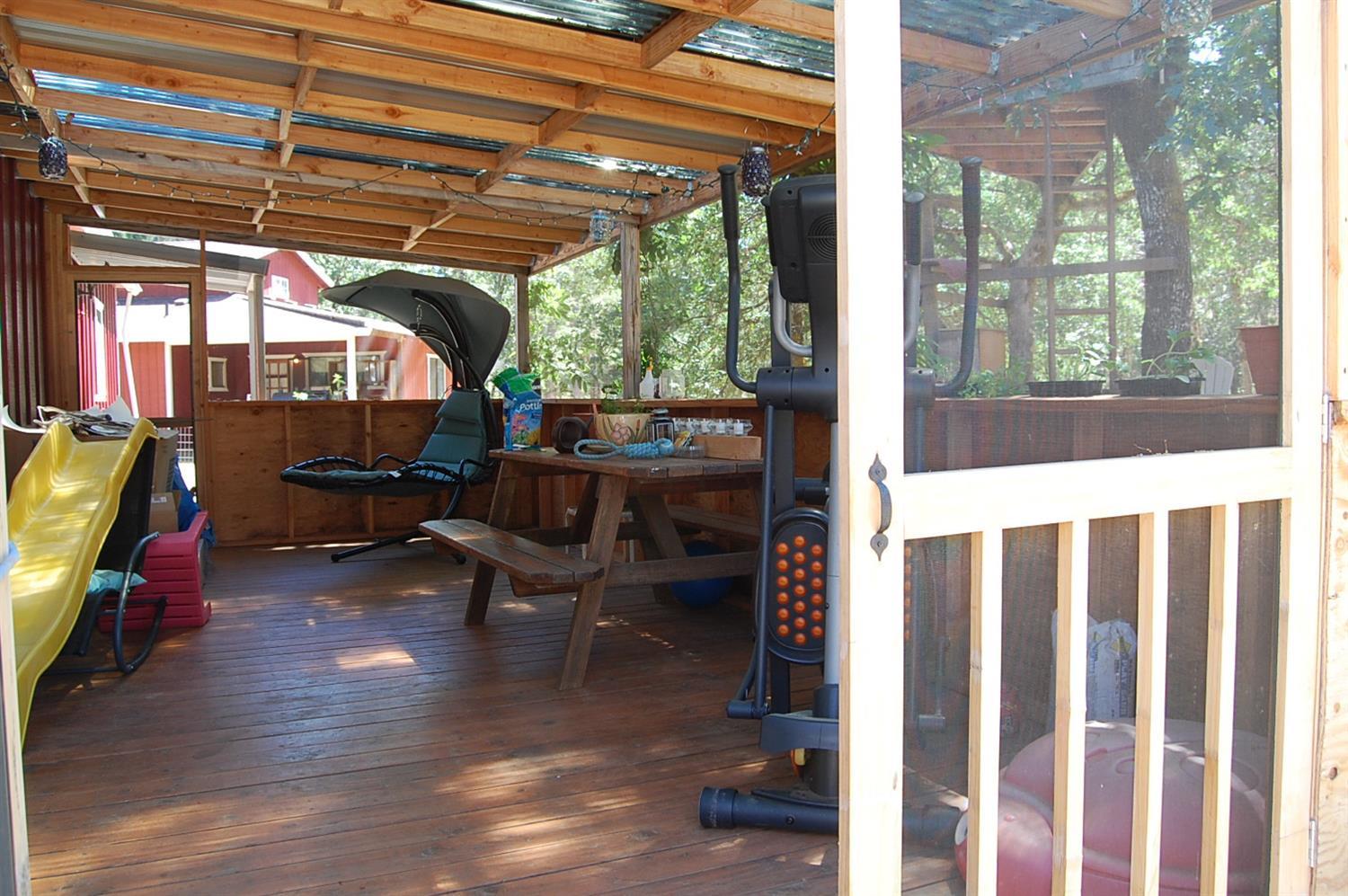 6006 Rockydale Road Cave Junction, OR 97523 - Photo 3 of 33 Enclosed patio