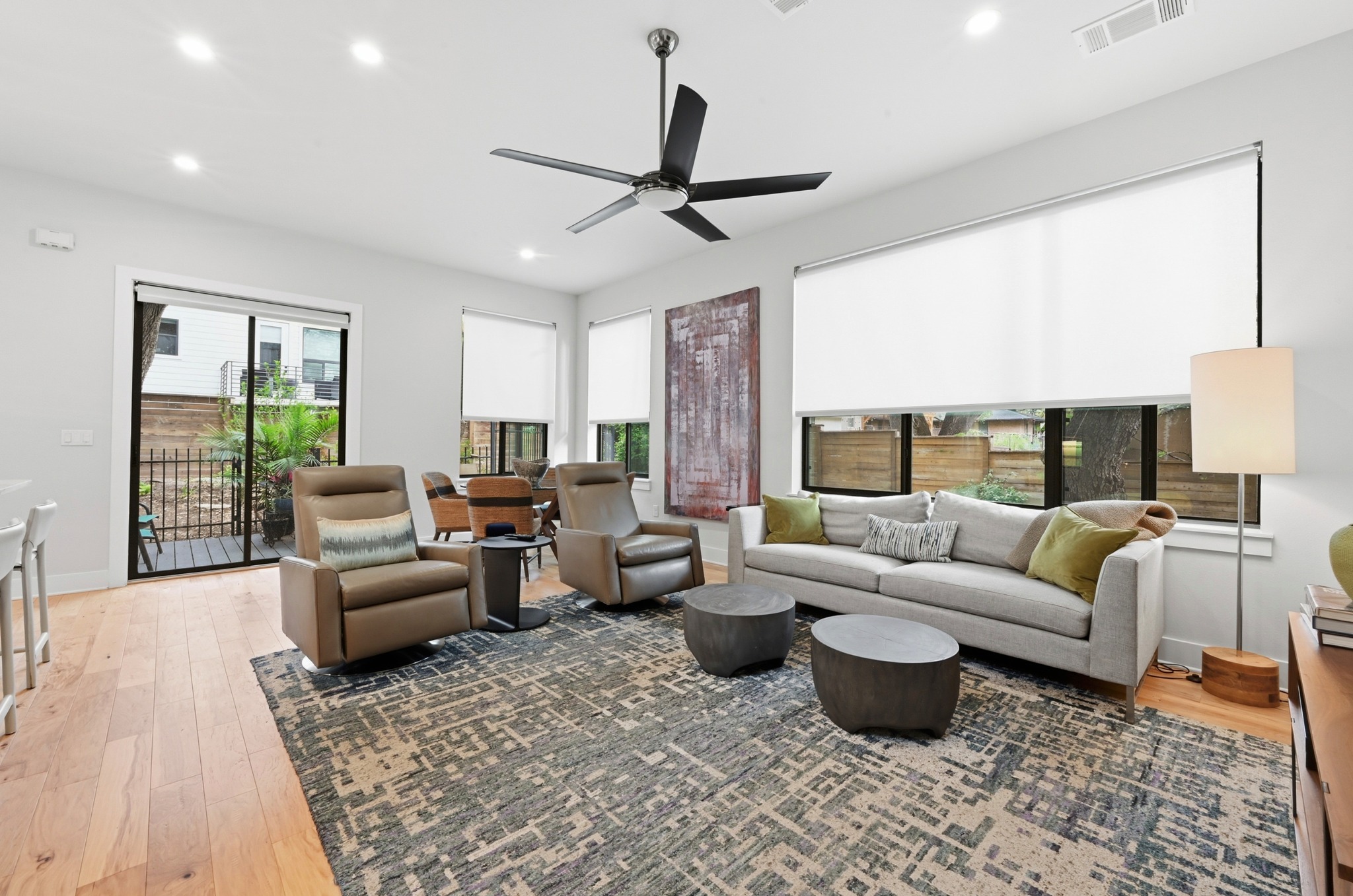 3115 Clawson Road, Unit 201 Austin, TX 78704 - Photo 14 of 34 Open-concept living space with light wood-finish flooring, recessed lighting, and a modern ceiling fan