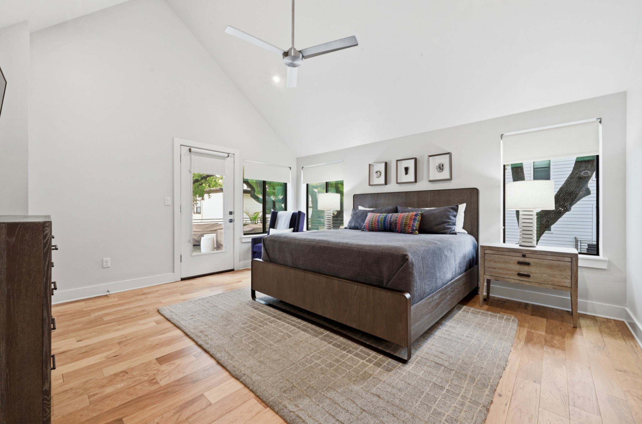 3115 Clawson Road, Unit 201 Austin, TX 78704 - Photo 16 of 34 Vaulted ceiling bedroom featuring light wood-finish flooring
