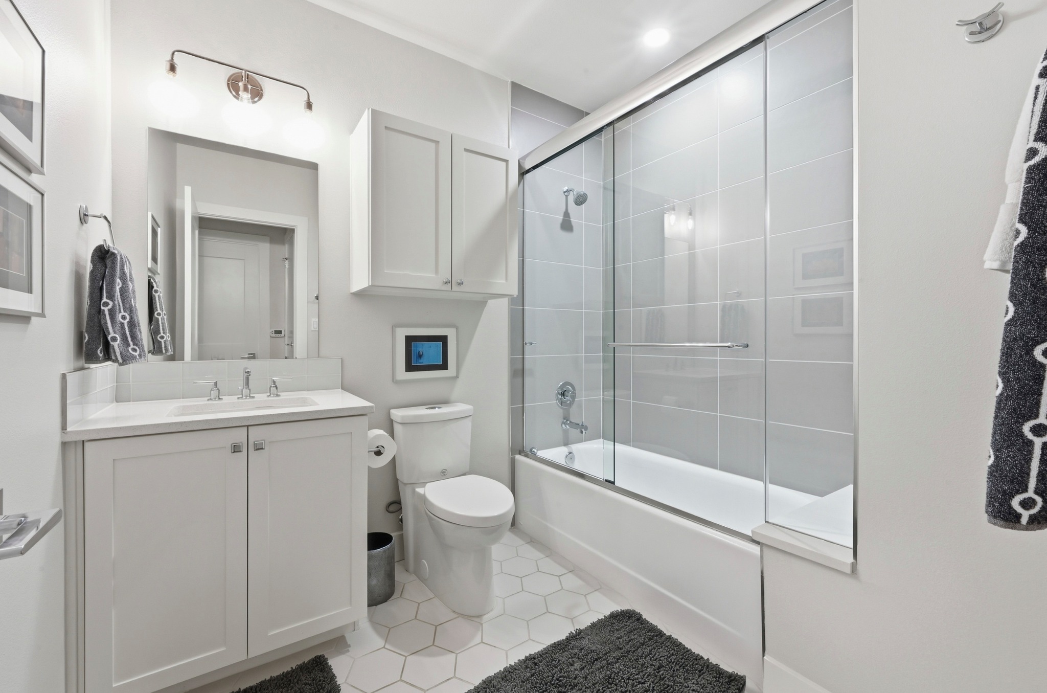3115 Clawson Road, Unit 201 Austin, TX 78704 - Photo 24 of 38 a bathroom with a sink toilet and shower