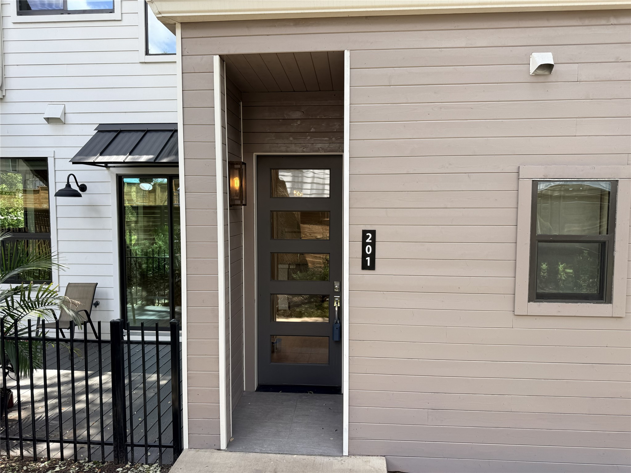 3115 Clawson Road, Unit 201 Austin, TX 78704 - Photo 5 of 38 a view of a door and a window